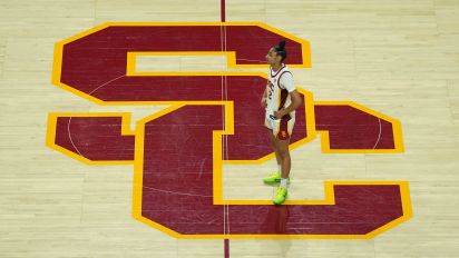 Getty Images - LOS ANGELES, CALIFORNIA - JANUARY 28: Southern California Trojans guard JuJu Watkins (12) stands on the SC logo at center court against the Washington Huskies during an NCAA college women's basketball game in Los Angeles on January 28, 2024 in Los Angeles, California. Washington defeated USC 62-49. (Photo by Kirby Lee/Getty Images)