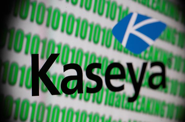 Kaseya logo and binary code seen in this illustration taken, July 5, 2021. REUTERS/Dado Ruvic/Illustration