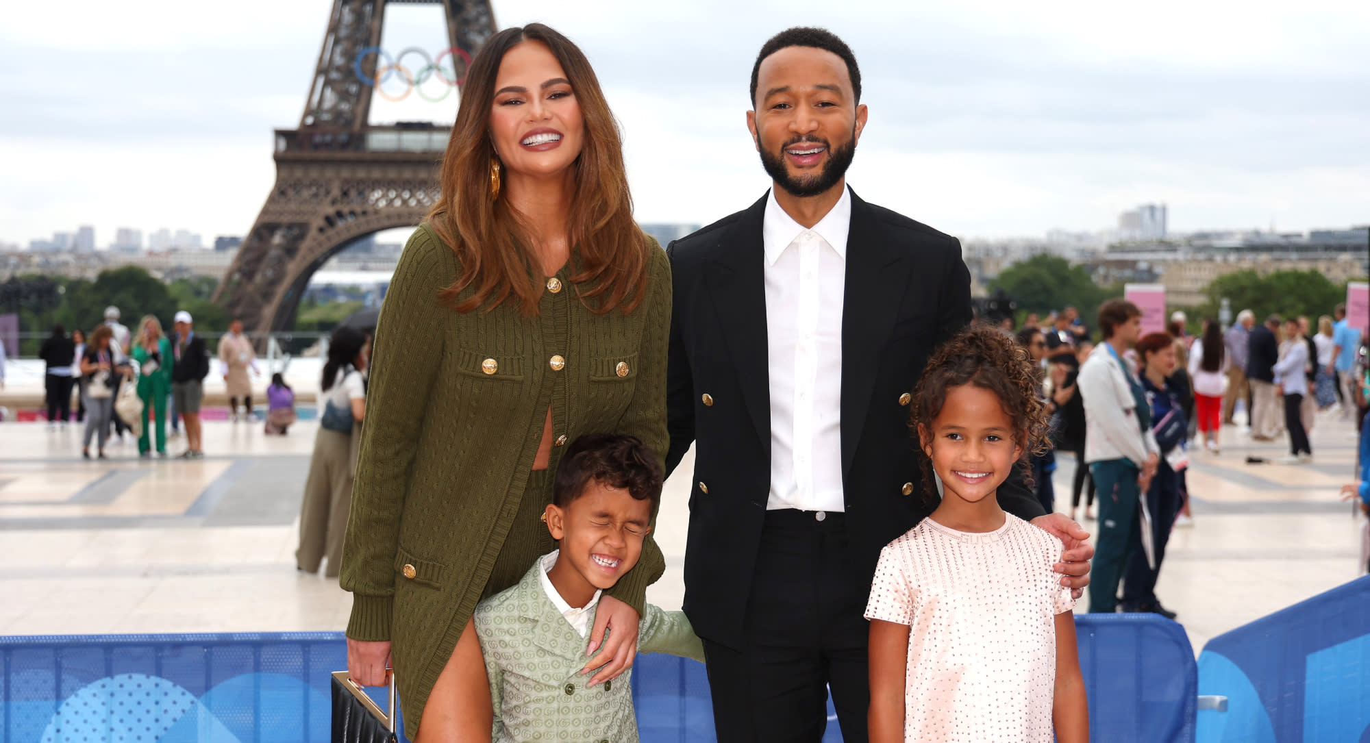 Chrissy Teigen Embraces Knitting in Chloé’s Micro Shorts, John Legend Suits Up in Louis Vuitton for Paris Olympics Opening Ceremony