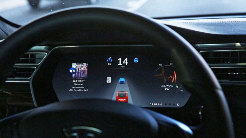 The dashboard of the software-updated Tesla Model S P90D shows the icons enabling Tesla's autopilot, featuring limited hands-free steering. 
