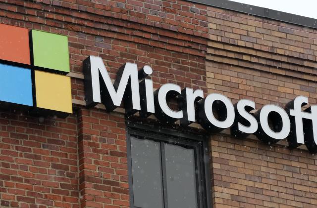 This is the Microsoft sign on a building in Pittsburgh on Thursday, Jan. 26, 2023. (AP Photo/Gene J. Puskar)