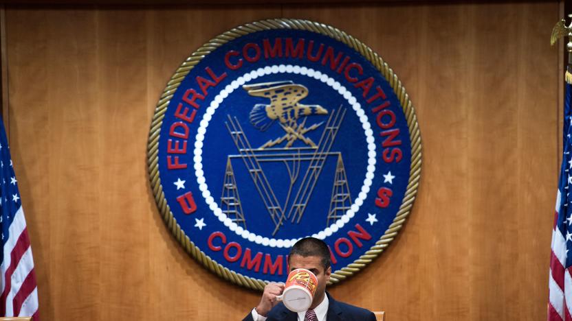 FCC Chairman Ajit Pai listens during a hearing at the Federal Communications Commission on December 14, 2017 in Washington, DC. / AFP PHOTO / Brendan Smialowski        (Photo credit should read BRENDAN SMIALOWSKI/AFP via Getty Images)