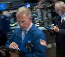 US stocks swoon, sending Dow down more than 650 points