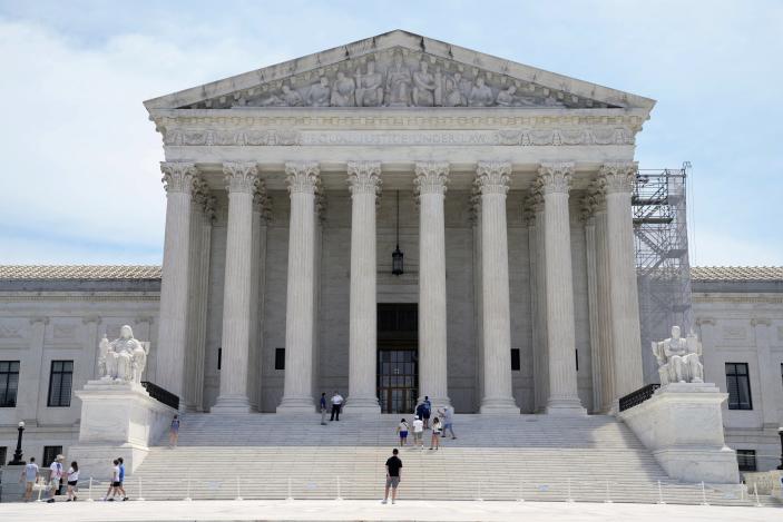 Tourists visit the Supreme Court, Tuesday, June 25, 2024, in Washington. (AP Photo/Jacquelyn Martin)