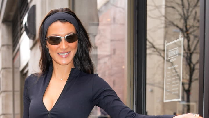 Kim Kardashian Paired a Silky Black Bodysuit With Opera Gloves and