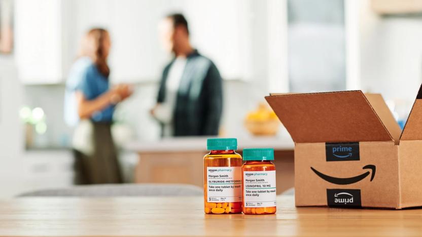 Bottles of medication on a counter right next to an Amazon box.