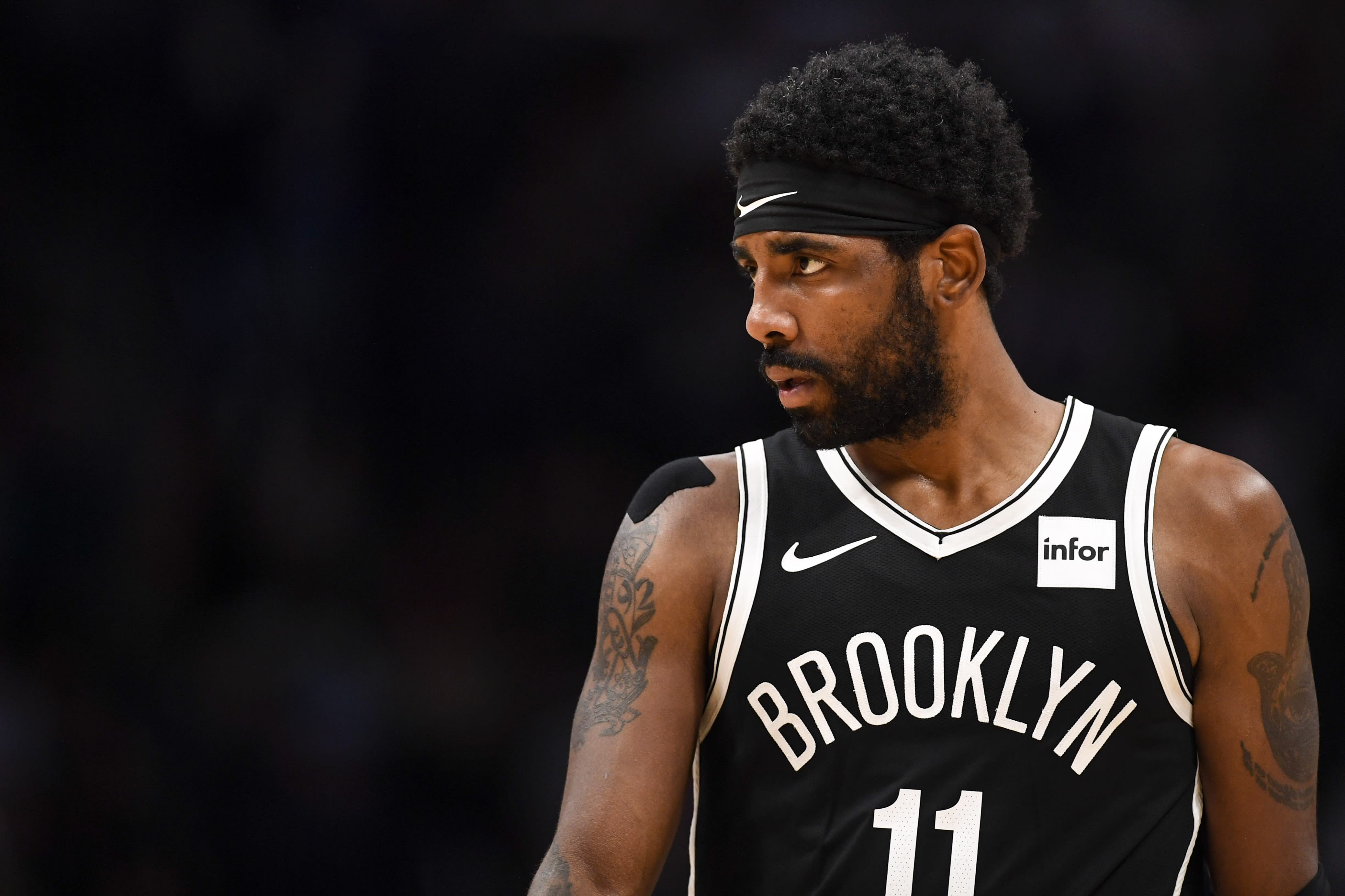 Irving kyrie nets shoulder brooklyn