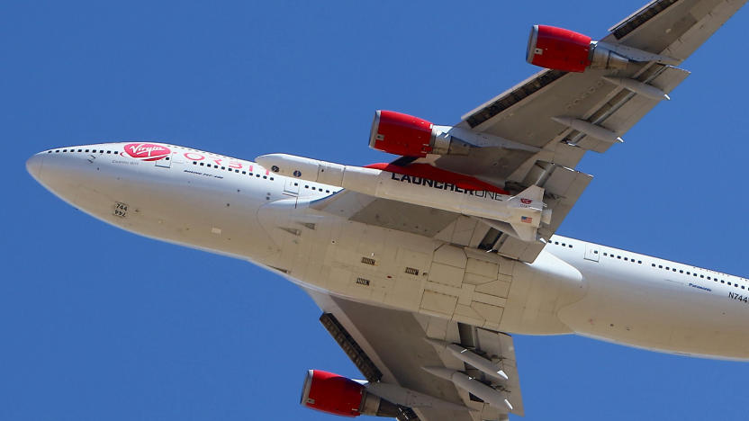 Virgin Orbit Boeing 747-400 rocket launch platform, named Cosmic Girl, takes off from Mojave Air and Space Port, Mojave (MHV) on its second orbital launch demonstration in the Mojave Desert, north of Los Angeles. (AP Photo/Matt Hartman)