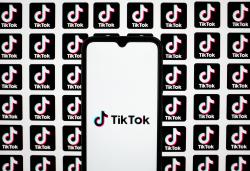 The TikTok logo is being displayed on a smartphone screen in Athens, Greece, on March 14, 2024. (Photo by Nikolas Kokovlis/NurPhoto via Getty Images)