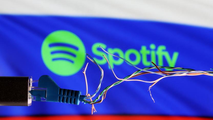 Broken Ethernet cable is seen in front of Russian flag and Spotify logo in this illustration taken March 11, 2022. REUTERS/Dado Ruvic/Illustration