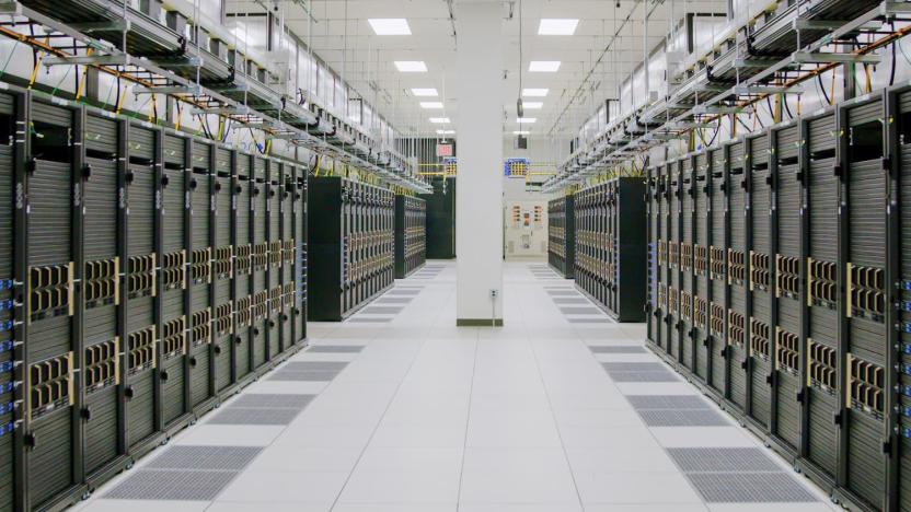 Rows of racks at Meta's AI Research SuperCluster supercomputer.