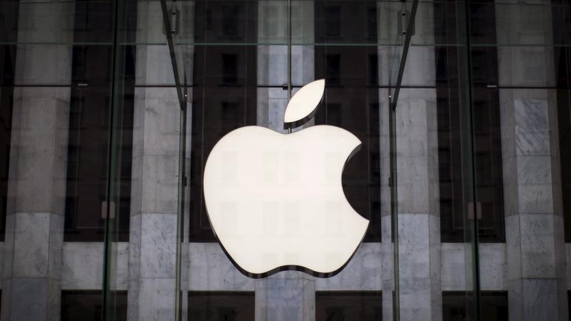 An Apple logo hangs above the entrance to the Apple store on 5th Avenue in the Manhattan borough of New York City, July 21, 2015. Apple Inc said it is experiencing some issues with its App Store, Apple Music, iTunes Store and some other services. The company did not provide details but said only some users were affected. Checks by Reuters on several Apple sites in Asia, Europe and North and South America all showed issues with the services. REUTERS/Mike Segar