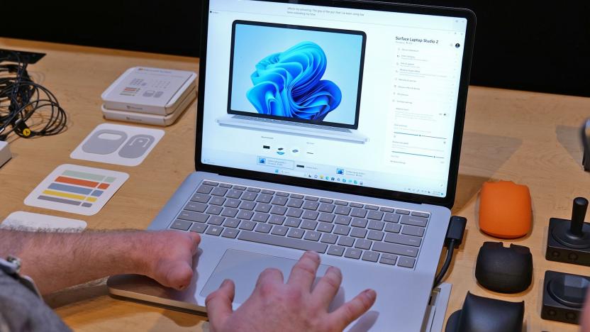 The Surface Laptop Studio 2 trackpad with a person using the trackpad.