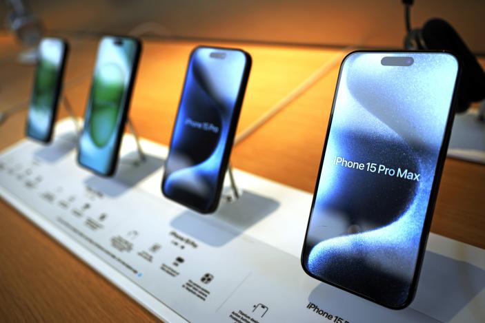 This is a display of Apple iPhone 15 ProMax phones in an Apple store in Pittsburgh, Monday, June 3, 2024. (AP Photo/Gene J. Puskar)