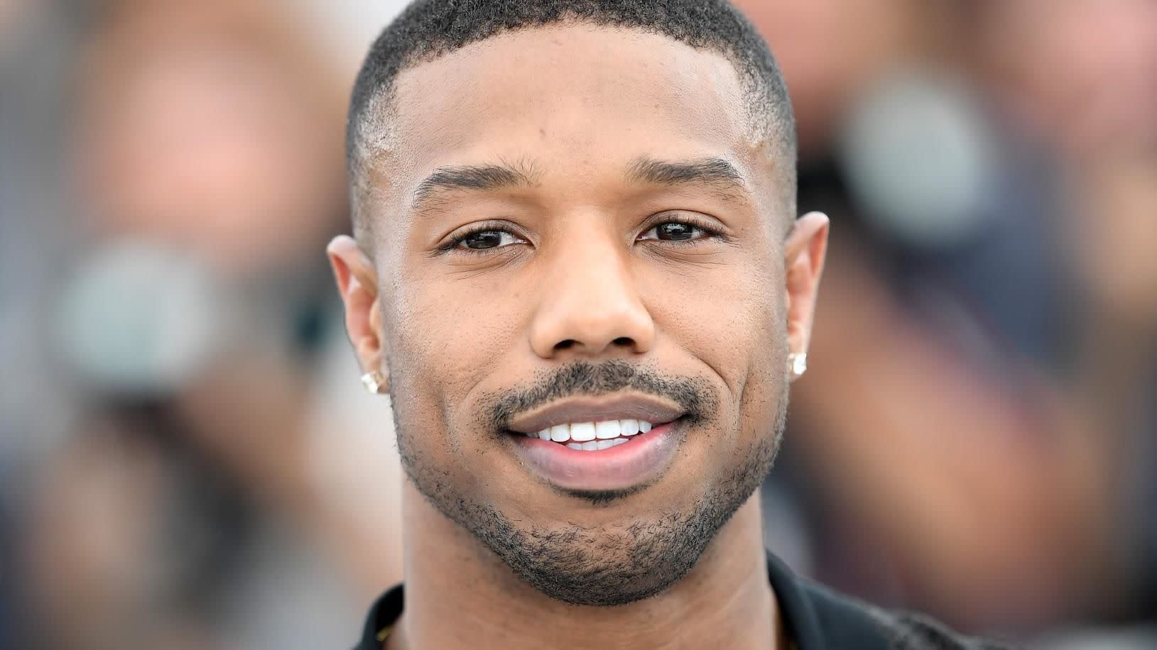 Michael B. Jordan flaunts his bulging biceps during photo shoot in