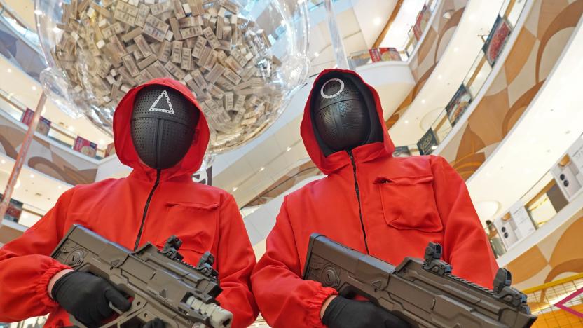 YANTAI, CHINA - NOVEMBER 13 2021: Workers dressed like characters in the Netflix series Squid Game pose to entertain visitors in a shopping mall in Yantai city in east China&#039;s Shandong province Saturday, Nov. 13, 2021. (Photo credit should read Feature China/Barcroft Media via Getty Images)