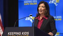 FILE — New York Gov. Kathy Hochul speaks during a news conference in New York, Oct. 11, 2023. New York Gov. Kathy Hochul signed a bill, Thursday, June 20, 2024, that would allow parents to block their children from getting social media posts suggested by a platform's algorithm, a move to limit feeds critics argue are addictive. (AP Photo/Seth Wenig, File)