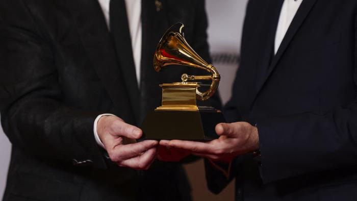 Michael Romanowski and Charlie Post pose with the Grammy for Best Classical Engineered Album for "Bates: Philharmonia Fantastique - The Making Of The Orchestra" during the Premiere Ceremony of the 65th Annual Grammy Awards in Los Angeles, California, U.S., February 5, 2023. REUTERS/Mike Blake - HP1EJ2601R891