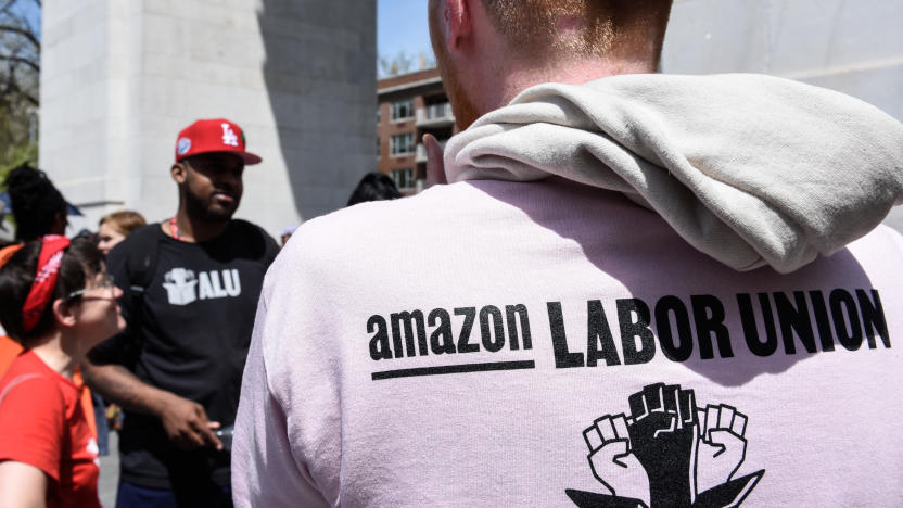 NEW YORK, NY - MAY 01: Amazon workers participate in a May Day rally in Manhattan on May 1, 2022 in New York City. Amazon workers recently unionized a facility in Staten Island called JFK8 emboldening other workers to push for their companies to unionize. (Photo by Stephanie Keith/Getty Images)