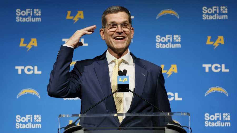 Getty Images - INGLEWOOD, CA - FEBRUARY 01: New Los Angeles Chargers Head Coach Jim Harbaugh speaks during his introductory press conference at YouTube Theater in Inglewood Thursday, Feb. 1, 2024. (Allen J. Schaben / Los Angeles Times via Getty Images)