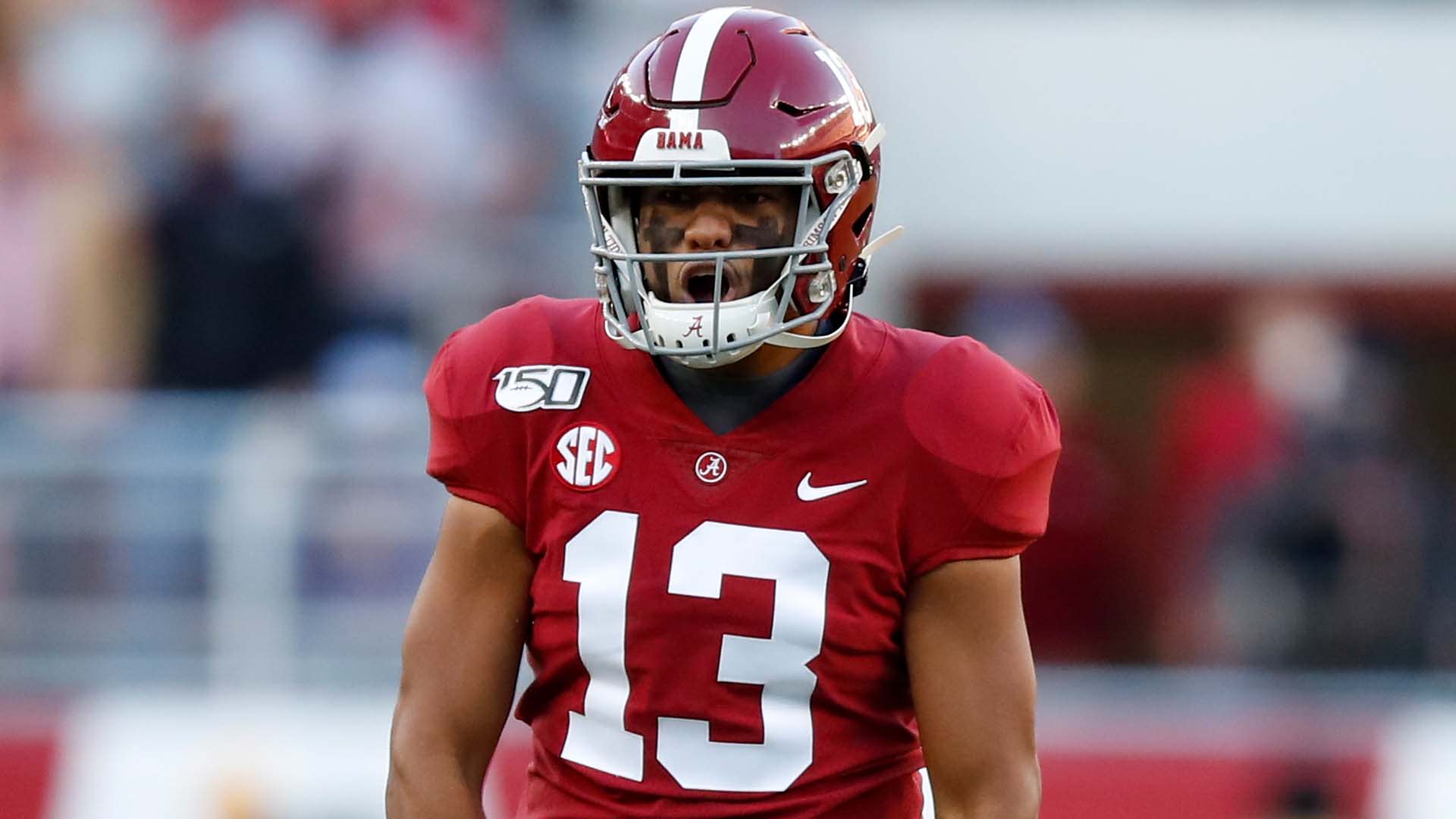 Tua looking like “Alabama Tua” with that red practice jersey