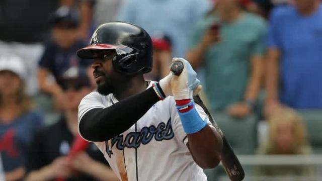 Phillips wins it again as Braves top Marlins 5-4