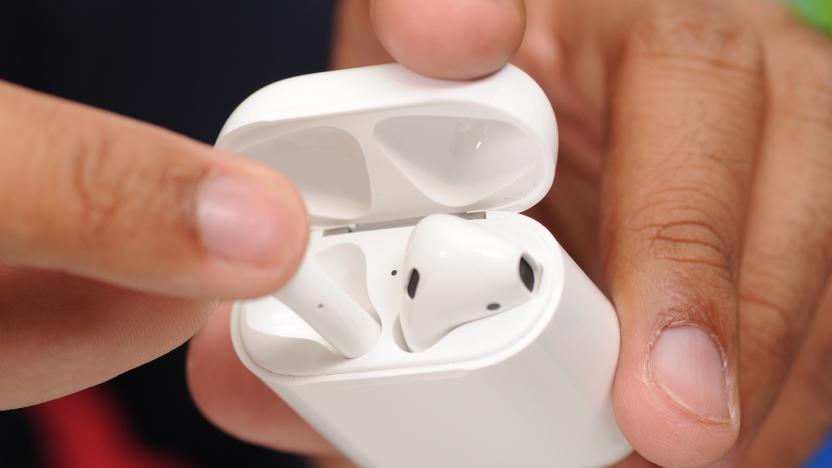 Apple AirPods in their charging case