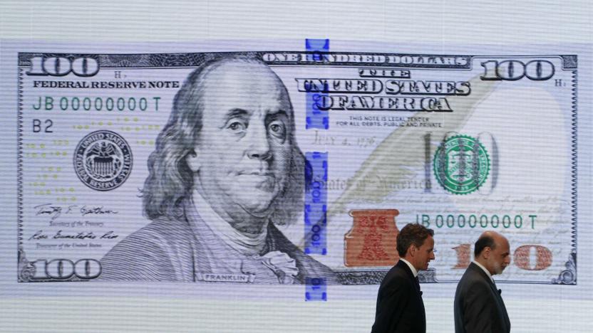 U.S. Treasury Secretary Timothy Geithner (L) and Federal Reserve Chairman Ben Bernanke leave a ceremony to debut the new design for the US$100 note at the Department of the Treasury in Washington, April 21, 2010. Officials from the U.S. Department of the Treasury, the Board of Governors of the Federal Reserve System and the United States Secret Service today unveiled the new design for the $100 note. Complete with advanced technology to combat counterfeiting, the new design for the $100 note retains the traditional look of U.S. currency.   REUTERS/Jim Young   (UNITED STATES - Tags: POLITICS BUSINESS)