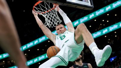 Getty Images - Boston, MA - June 6: Kristaps Porzingis #8 of the Boston Celtics dunks during the first quarter of Game 1 of the NBA Finals against the Dallas Mavericks at the TD Garden.  (Photo by Matt Stone/MediaNews Group/Boston Herald via Getty Images)