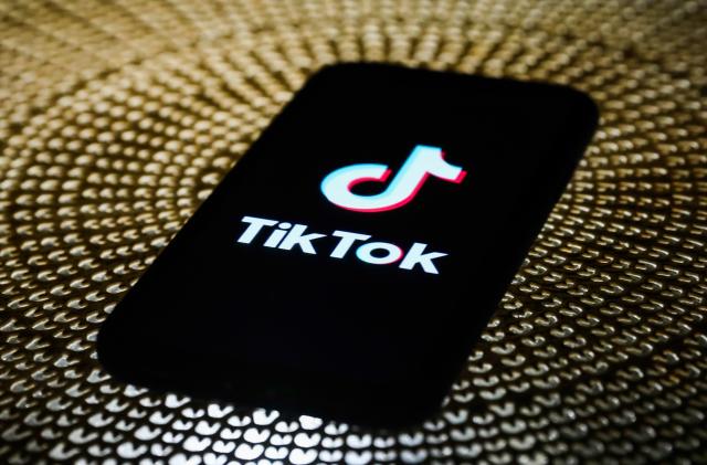 TikTok logo is seen displayed on a phone screen in this illustration photo taken on October 3, 2020. (Photo by Jakub Porzycki/NurPhoto via Getty Images)