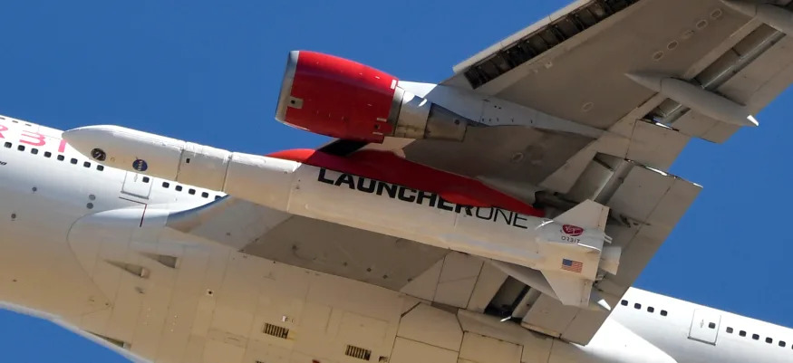 A view of Richard Branson's Virgin Orbit, with a rocket underneath the wing of a modified Boeing 747 jetliner, during test launch of its high-altitude launch system for satellites from Mojave, California, U.S. January 17, 2021. REUTERS/Gene Blevins