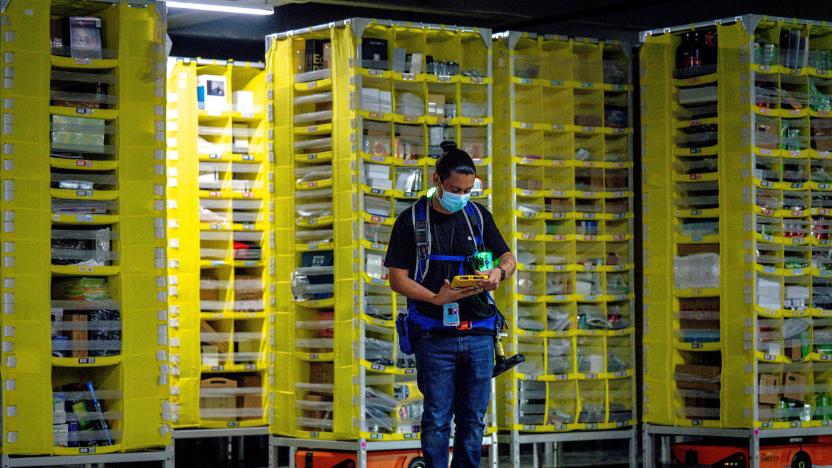 EASTVALE, CA - AUGUST 31: Amnesty technician Gustavo Morales controls logistics robots at Amazon fulfillment center in Eastvale on Tuesday, Aug. 31, 2021. (Photo by Watchara Phomicinda/MediaNews Group/The Press-Enterprise via Getty Images)