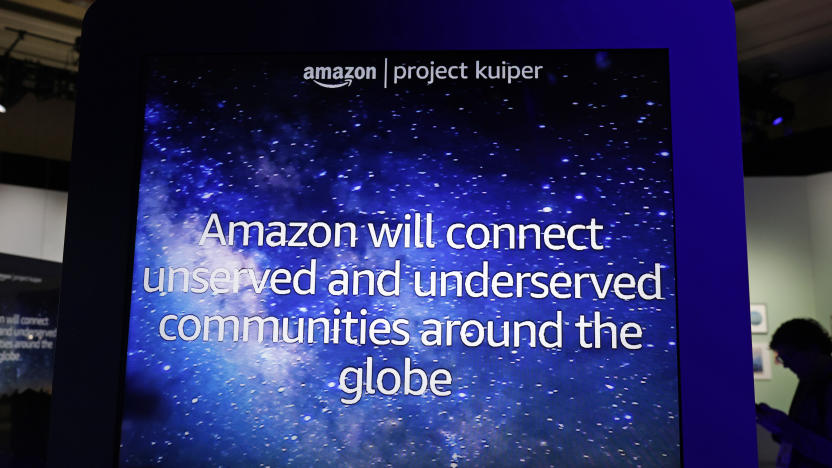 LAS VEGAS, NEVADA - JANUARY 07: Amazon’s description of Project Kuiper, an initiative to build a low Earth orbit (LEO) satellite constellation capable of providing reliable, affordable broadband service to unserved and underserved communities around the world, is displayed on a screen at CES 2023 at Venetian Expo on January 07, 2023 in Las Vegas, Nevada. CES, the world's largest annual consumer technology trade show, runs through January 08 and features about 3,200 exhibitors showing off their latest products and services to more than 100,000 attendees. (Photo by Alex Wong/Getty Images)