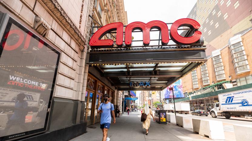 NEW YORK, NEW YORK - JUNE 08: People walk outside AMC Empire 25 movie theater in Times Square on June 08, 2021 in New York City. On May 19, all pandemic restrictions, including mask mandates, social distancing guidelines, venue capacities and curfews were lifted by New York Governor Andrew Cuomo.  (Photo by Noam Galai/Getty Images)