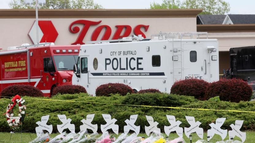 A memorial is seen in the wake of a weekend shooting at a Tops supermarket in Buffalo, New York, U.S. May 18, 2022.  REUTERS/Brendan McDermid