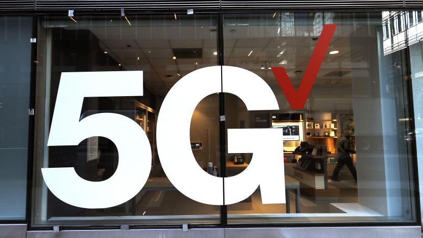 Verizon store front displays the 5G network near Grand...