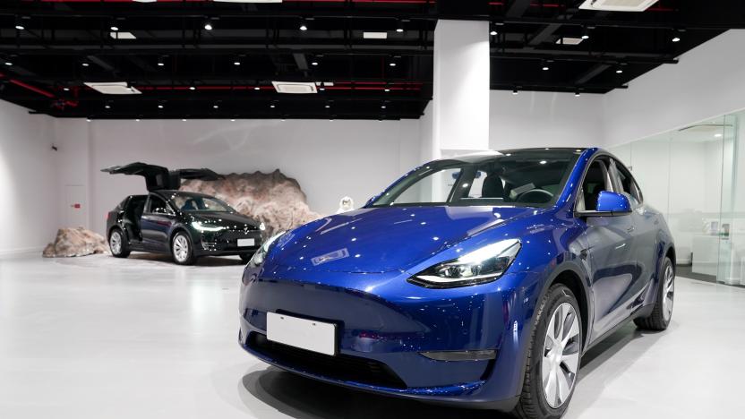 SHANGHAI, Jan. 18, 2021 -- A Tesla Model Y vehicle is pictured at a Tesla Center in east China's Shanghai, Jan. 18, 2021.
  U.S. electric carmaker Tesla Inc. on Monday began Shanghai deliveries of its built-in-China Model Y.
   On Jan. 7, 2020, Tesla launched the project to manufacture Model Y vehicles in its Shanghai Gigafactory, its first overseas plant outside the United States. The China-made model went on sale on Jan. 1. (Photo by Ding Ting/Xinhua via Getty) (Xinhua/Ding Ting via Getty Images)