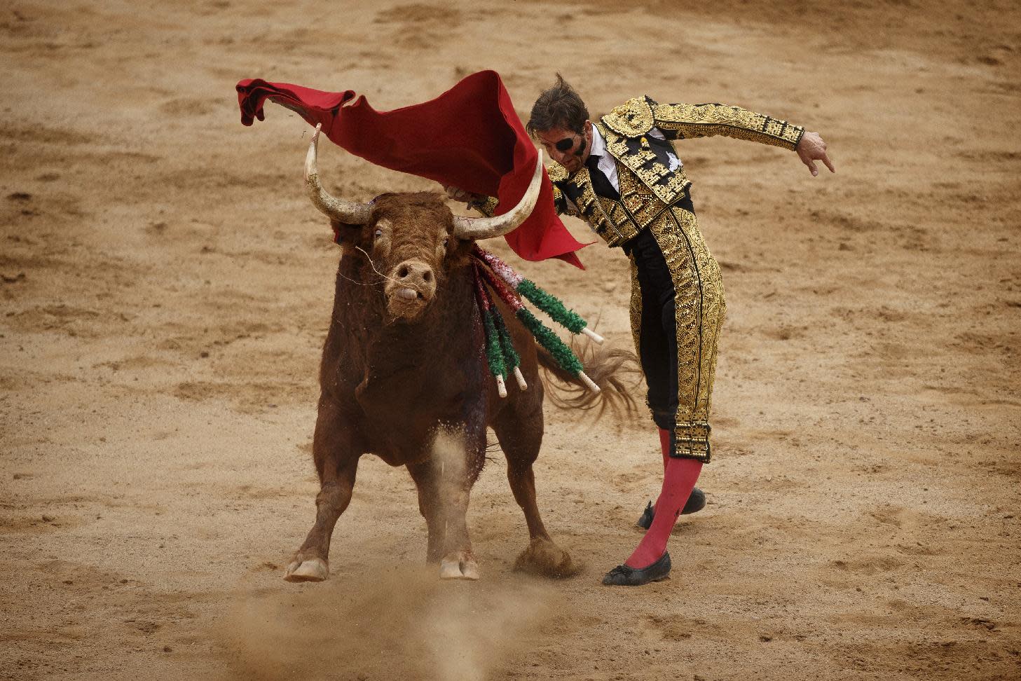 AP PHOTOS Spain's Running of the Bulls