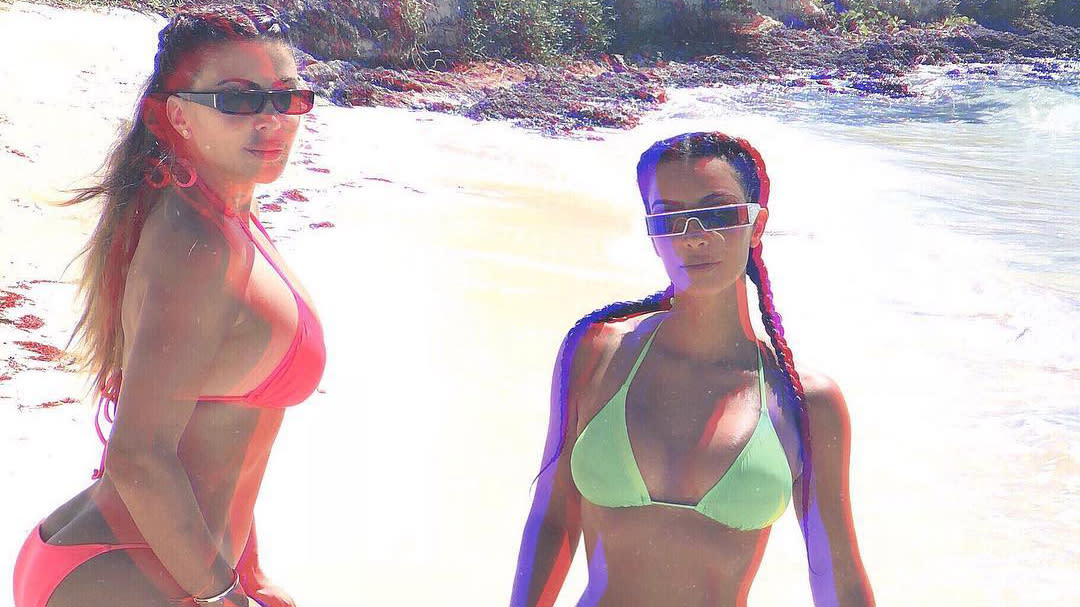 Kim Kardashian Gets 'Wet & Wild' in Neon Bikini During Beach Outing with  Larsa Pippen