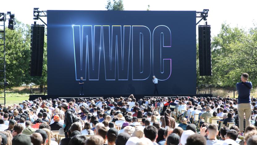 06 June 2022, US, Cupertino: Apple software chief Craig Federighi (r) welcomes attendees to Apple's WWDC 2022 developer conference at the company's headquarters, Apple Park, in Cupertino, California. Apple gives a preview of the future features of its devices on Monday. Photo: Christoph Dernbach/dpa (Photo by Christoph Dernbach/picture alliance via Getty Images)