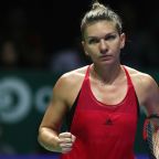 Halep overpowers Garcia in WTA Finals opener