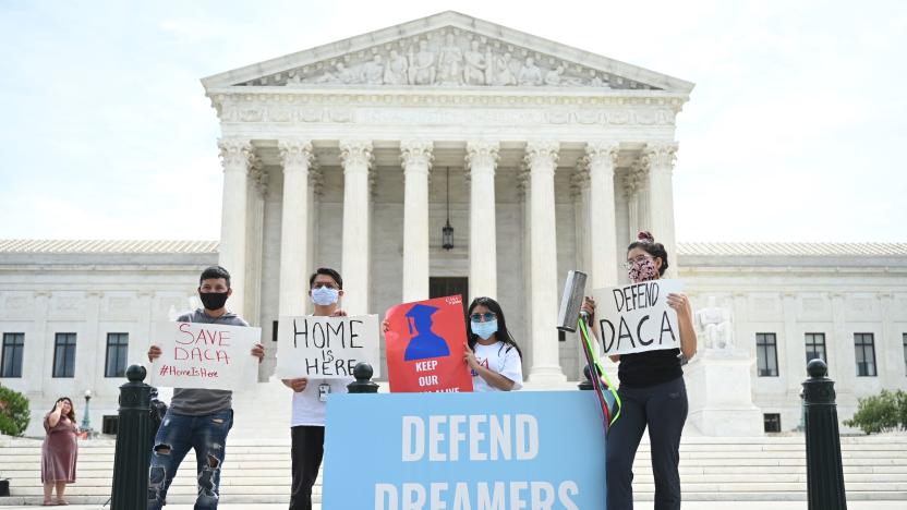 Deferred Action for Childhood Arrivals (DACA) demonstrators stand outside the US Supreme Court in Washington, DC, on June 15, 2020. (Photo by JIM WATSON / AFP) (Photo by JIM WATSON/AFP via Getty Images)