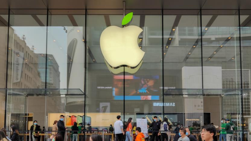 SHANGHAI, CHINA - APRIL 16, 2021 - The Apple store's LOGO lit up with green leaves to mark World Earth Day, and the company's staff wore green clothing. 16 April 2021, Shanghai, China.&#xA; (Photo credit should read Costfoto/Barcroft Media via Getty Images)