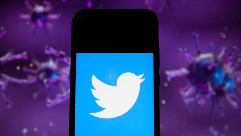 POLAND - 2020/04/28: In this photo illustration a Twitter logo displayed on a smartphone with a COVID 19 sample image in the background. (Photo Illustration by Omar Marques/SOPA Images/LightRocket via Getty Images)