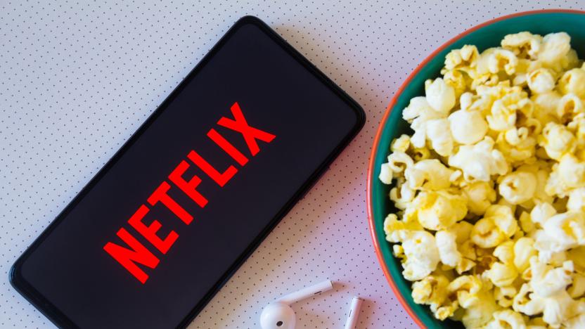 BRAZIL - 2022/04/19: In this photo illustration, the Netflix logo seen displayed on a smartphone along with a bowl of popcorn and headphones. (Photo Illustration by Rafael Henrique/SOPA Images/LightRocket via Getty Images)