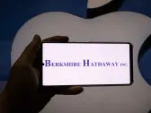 Warren Buffett's Berkshire Hathaway slashes Apple stake