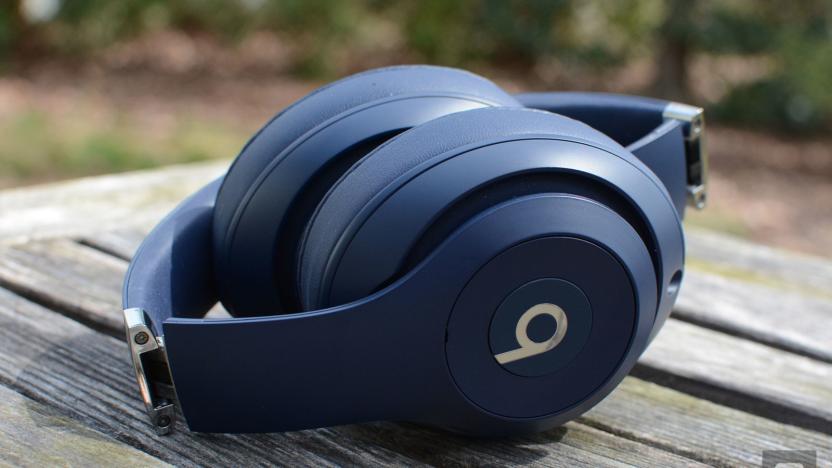 Blue Beats Studio3 headphones on a picnic table. 