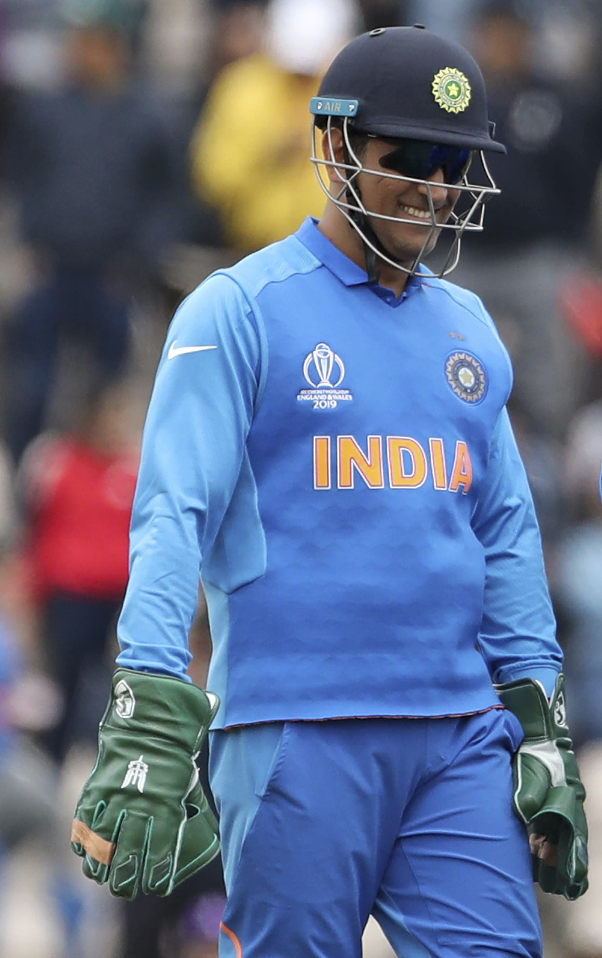 The Latest: ICC to India wicketkeeper Dhoni: Logo has to go