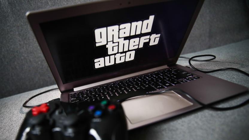 Grand Theft Auto logo displayed on a laptop screen and a gamepad are seen in this illustration photo taken in Krakow, Poland on September 21, 2021. (Photo by Jakub Porzycki/NurPhoto via Getty Images)