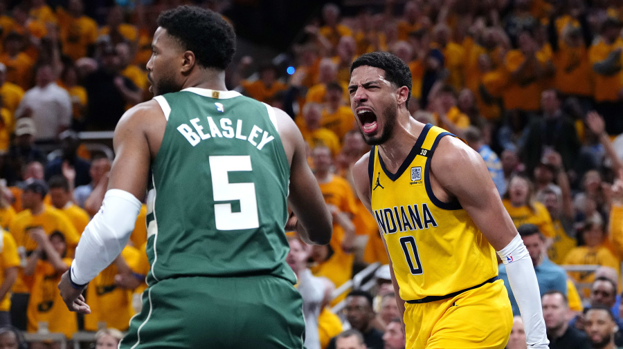 Getty Images - INDIANAPOLIS, INDIANA - MAY 02: Tyrese Haliburton #0 of the Indiana Pacers reacts after a dunk while Malik Beasley #5 of the Milwaukee Bucks looks on during the first quarter of game six of the Eastern Conference First Round Playoffs at Gainbridge Fieldhouse on May 02, 2024 in Indianapolis, Indiana.  (Photo by Dylan Buell/Getty Images)